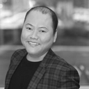 Design specialist Addison T providing professional hair design and styling services at the Redmond salon location