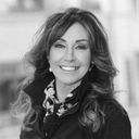 Color specialist Alex A providing professional hair color services at the Southcenter salon location