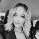 Design specialist Alexa G offering professional hair design and styling services at the Southcenter salon location