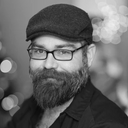 Color specialist Dan G providing professional hair color services at the Redmond salon location